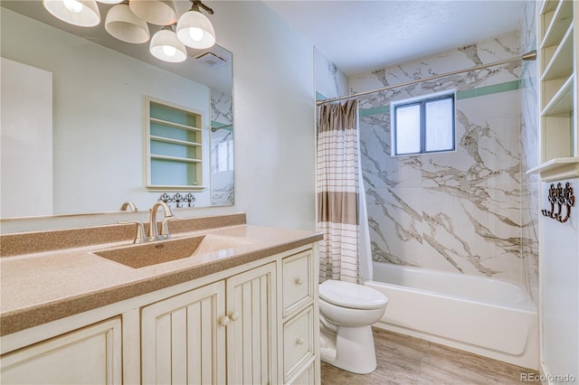 full bath featuring toilet, visible vents, vanity, and shower / bathtub combination with curtain