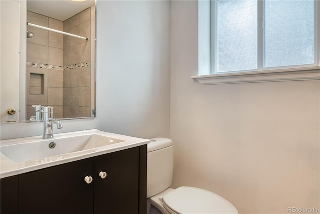 full bathroom with vanity and toilet