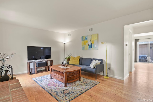 10310 E Jewell Ave Unit 55, Aurora, CO 80247 - living area featuring wood finished floors and baseboards
