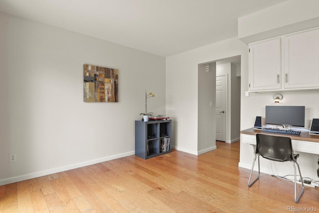 10310 E Jewell Ave Unit 55, Aurora, CO 80247 - home office with light wood finished floors and baseboards