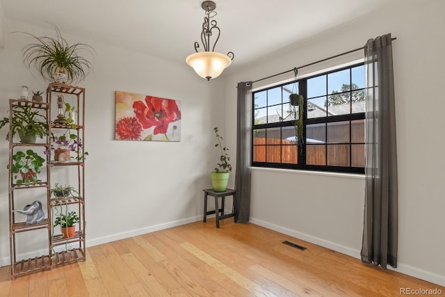 10310 E Jewell Ave Unit 55, Aurora, CO 80247 - empty room featuring wood-type flooring and baseboards