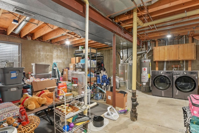 10310 E Jewell Ave Unit 55, Aurora, CO 80247 - below grade area with water heater and washing machine and clothes dryer