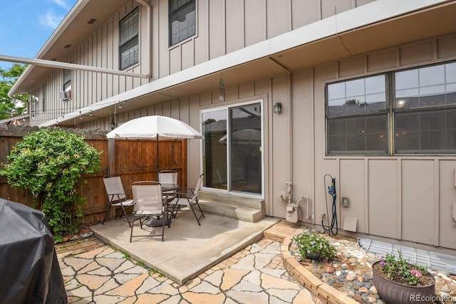 10310 E Jewell Ave Unit 55, Aurora, CO 80247 - view of patio with outdoor dining area and a grill