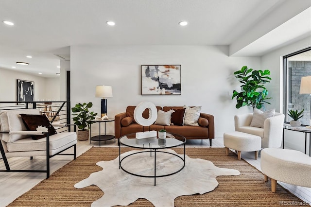 living area featuring recessed lighting and wood finished floors