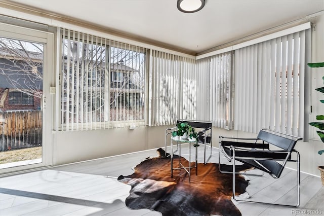 sunroom / solarium featuring plenty of natural light