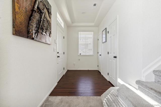 doorway to outside with dark hardwood / wood-style floors