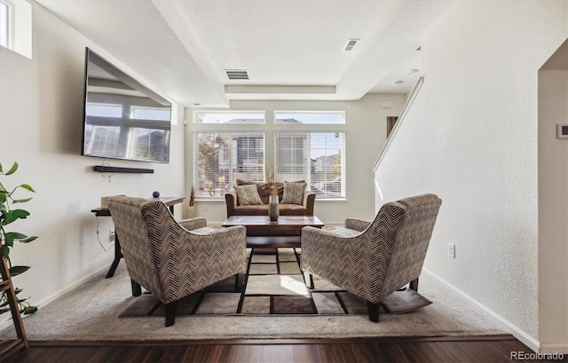 sitting room featuring wood-type flooring