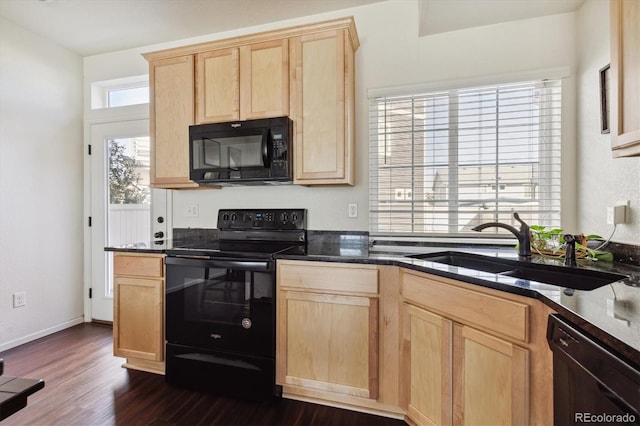 kitchen with dark wood-type flooring, light brown cabinets, black appliances, and sink