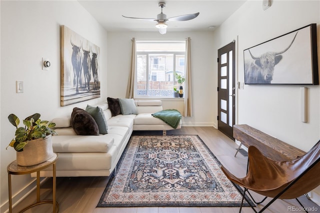1922 E 18th Ave, Denver, CO 80206 - living area featuring wood finished floors and a ceiling fan