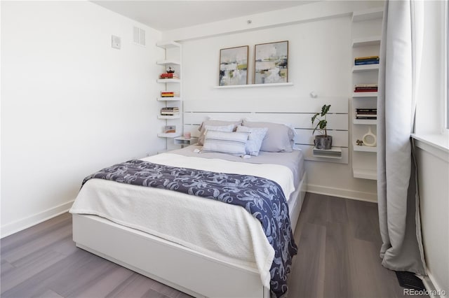 1922 E 18th Ave, Denver, CO 80206 - bedroom featuring wood finished floors and baseboards