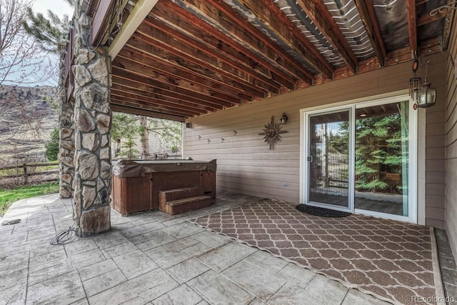 580 Eagle Nest Ct, Golden, CO 80401 - view of patio / terrace featuring a hot tub and fence