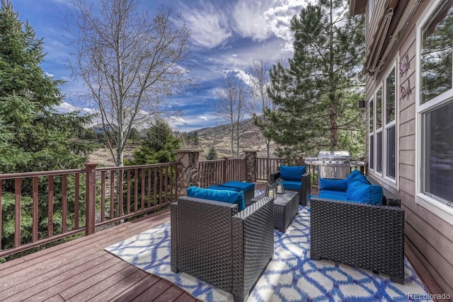 580 Eagle Nest Ct, Golden, CO 80401 - wooden terrace featuring an outdoor hangout area and a grill