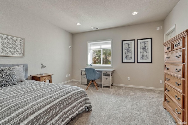 580 Eagle Nest Ct, Golden, CO 80401 - bedroom featuring a textured ceiling, light carpet, baseboards, and recessed lighting