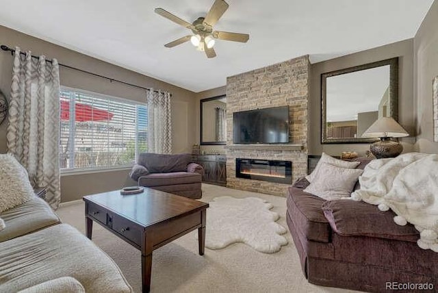 18655 E Garden Pl, Aurora, CO 80015 - living room featuring a ceiling fan, carpet flooring, baseboards, and a fireplace