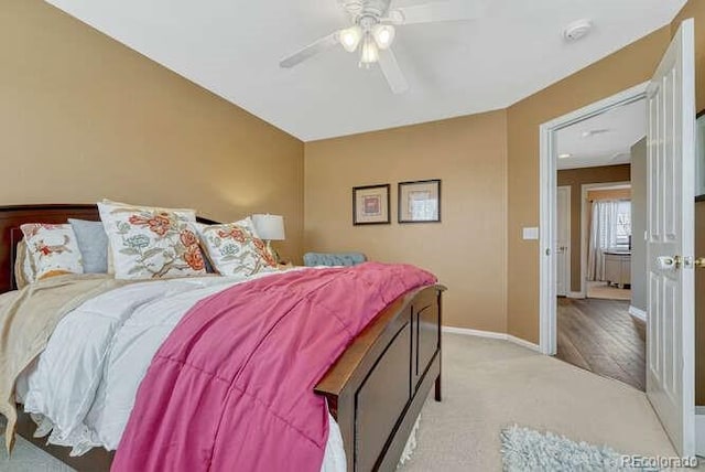 18655 E Garden Pl, Aurora, CO 80015 - bedroom featuring light colored carpet, a ceiling fan, and baseboards