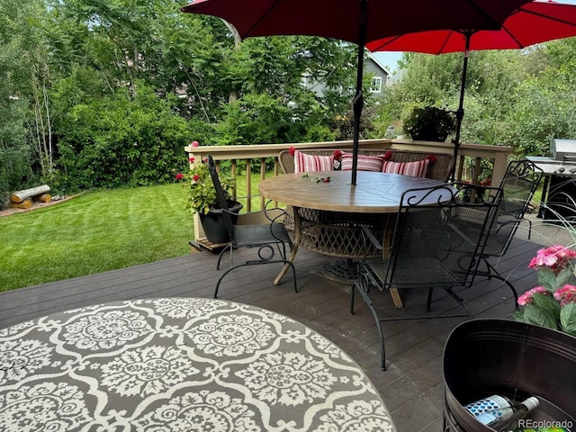 18655 E Garden Pl, Aurora, CO 80015 - deck with outdoor dining space and a lawn