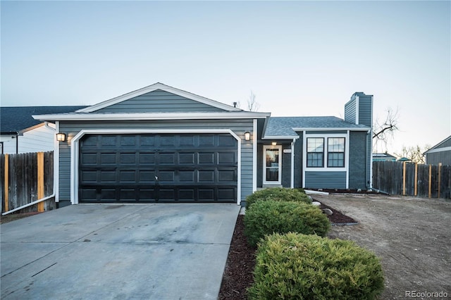 single story home featuring a garage