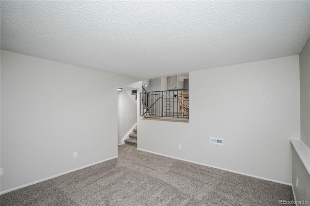 interior space with a textured ceiling