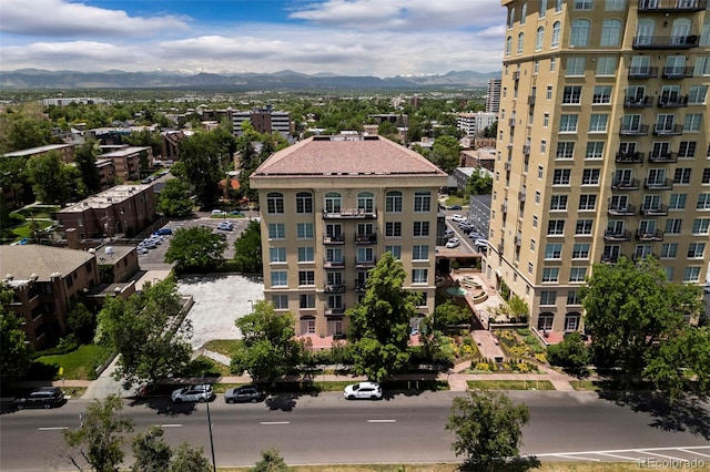 birds eye view of property featuring a mountain view