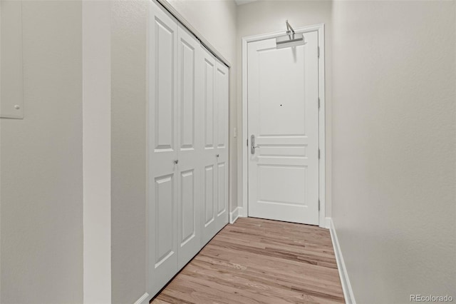 corridor featuring light hardwood / wood-style flooring