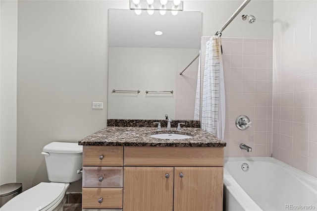 full bathroom featuring toilet, vanity, and shower / tub combo