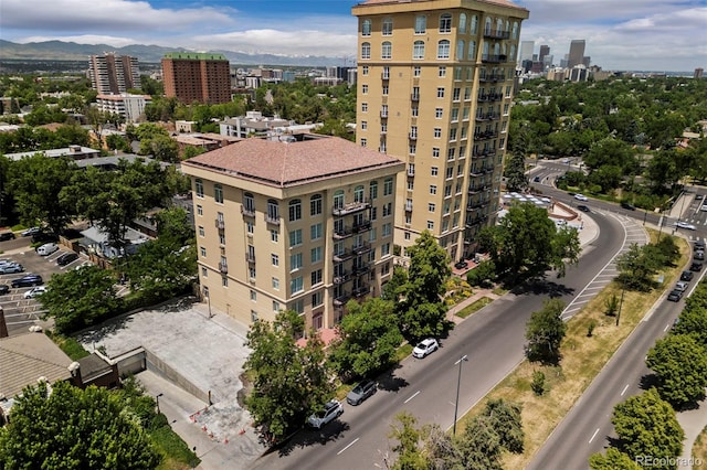 birds eye view of property featuring a mountain view