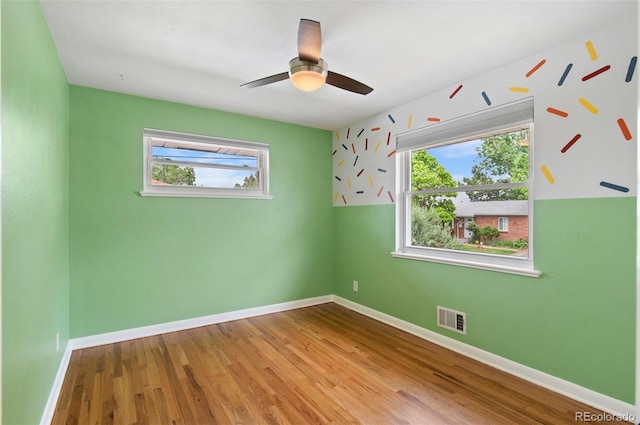 5315 Newland St, Arvada, CO 80002 - empty room featuring wood finished floors, baseboards, and a ceiling fan