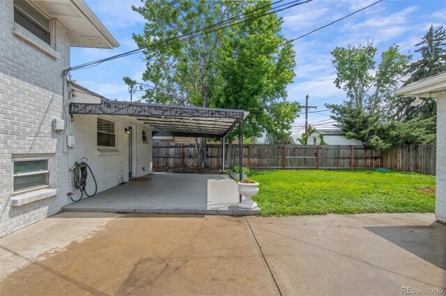 5315 Newland St, Arvada, CO 80002 - view of patio / terrace with a carport