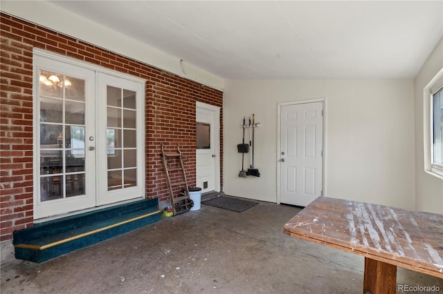 160 Northglenn Dr, Northglenn, CO 80233 - property entrance with french doors and brick siding