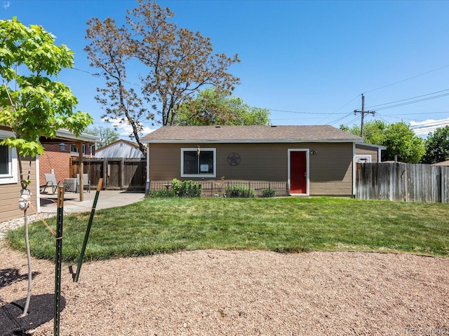 160 Northglenn Dr, Northglenn, CO 80233 - rear view of property with a patio area and a shingled roof