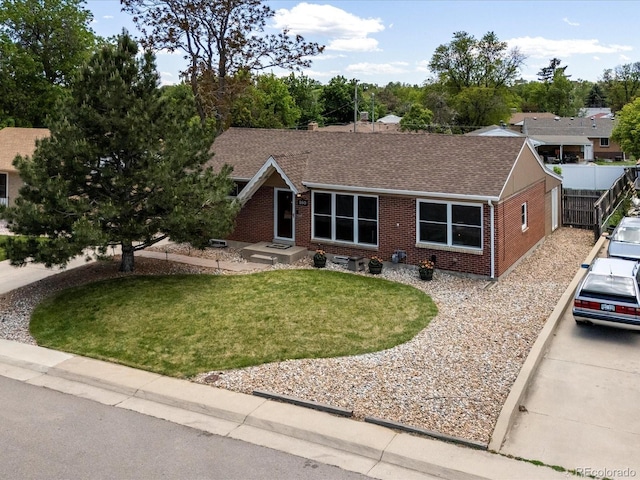 160 Northglenn Dr, Northglenn, CO 80233 - view of front of property with brick siding and a shingled roof