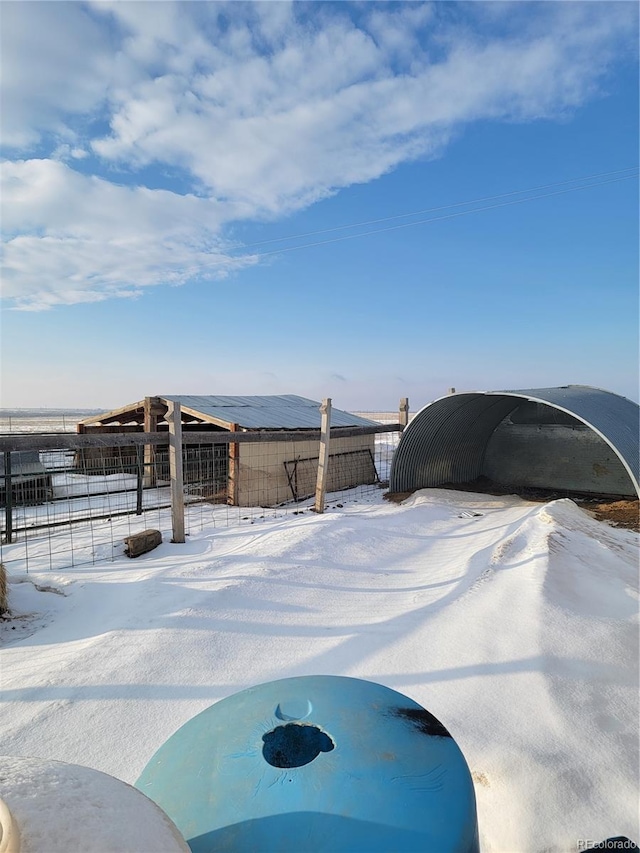 view of yard covered in snow