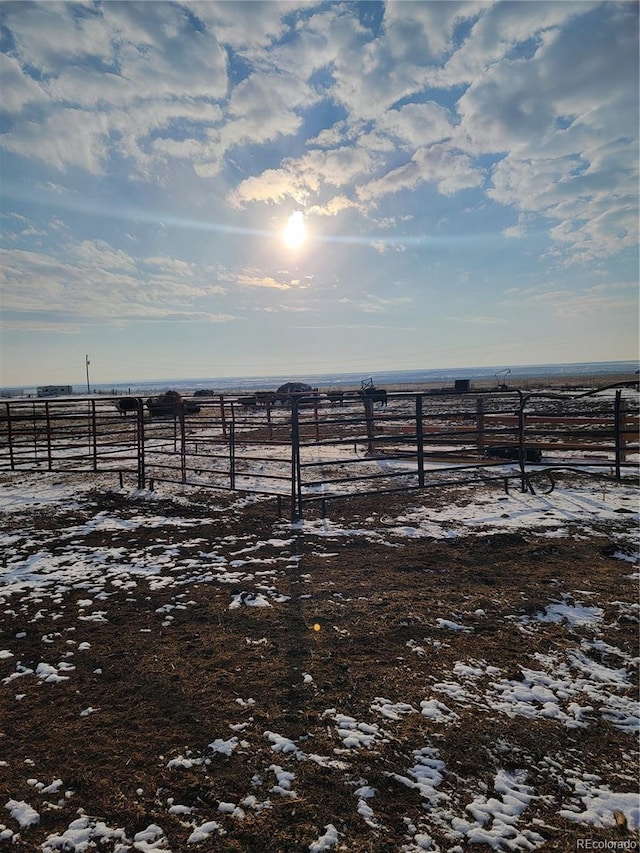 view of yard with a rural view