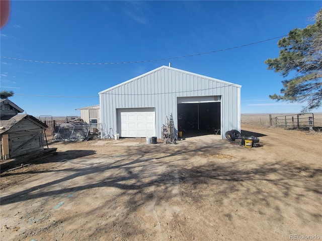 detached garage with fence