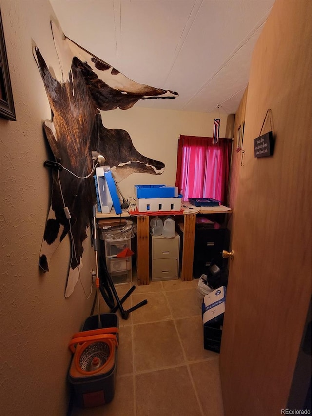 interior space featuring tile patterned flooring