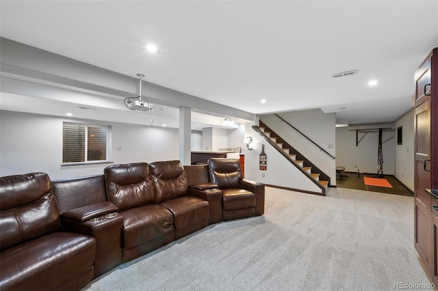 living room featuring visible vents, a dry bar, stairs, light carpet, and recessed lighting