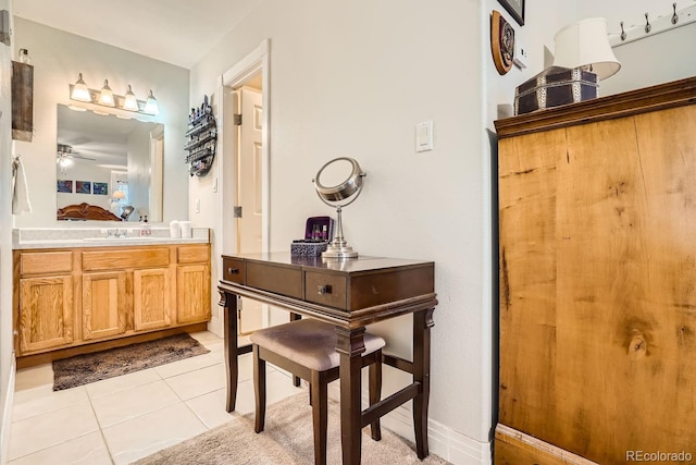 bathroom with tile patterned floors, ceiling fan, and vanity