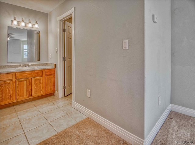 bathroom with vanity, tile patterned floors, and ceiling fan