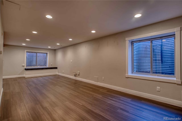 empty room with wood-type flooring