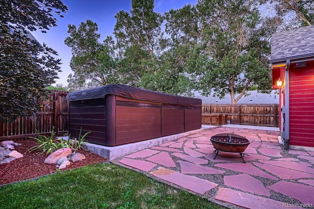 view of patio featuring a fire pit