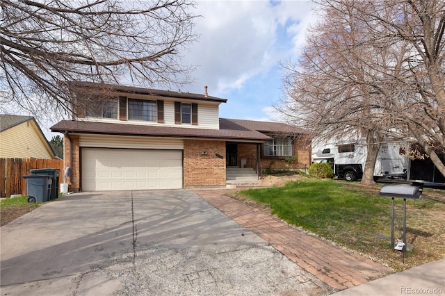 view of front of property with driveway, a garage, brick siding, fence, and a front lawn