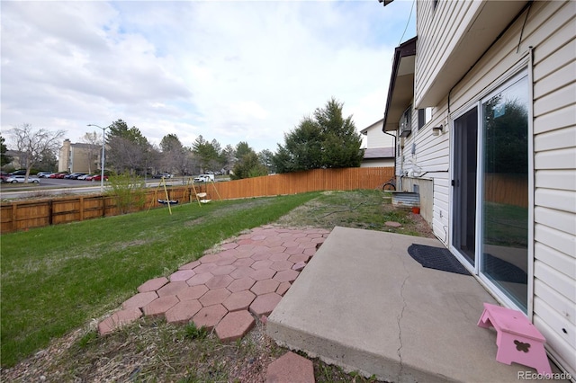 view of yard featuring a fenced backyard and a patio area