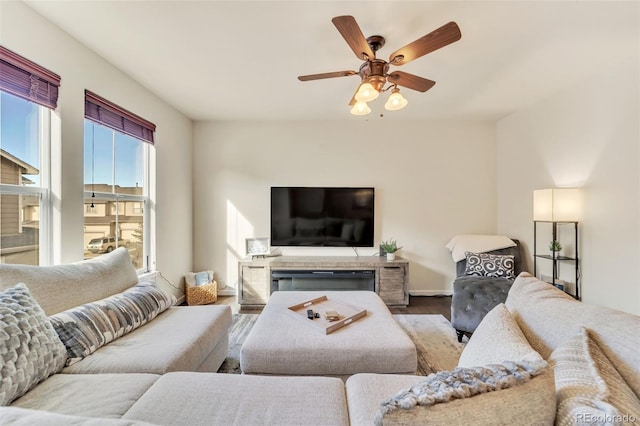 living room featuring hardwood / wood-style flooring and ceiling fan