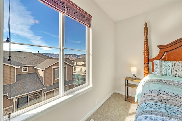 bedroom with light carpet