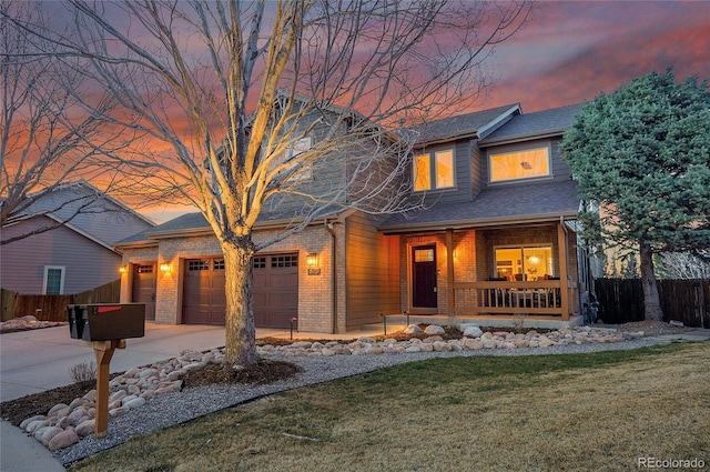 view of front of house featuring covered porch, fence, concrete driveway, and a garage