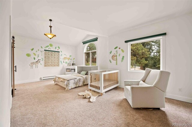 bedroom with carpet floors, a baseboard radiator, baseboards, and lofted ceiling