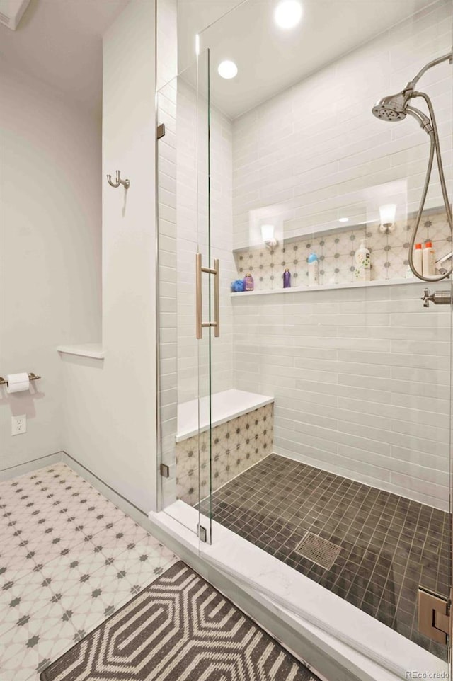 full bathroom with recessed lighting and a stall shower