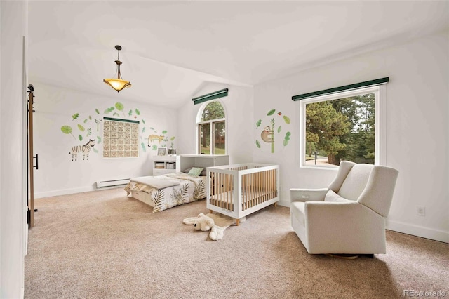 24140 US Highway 40, Golden, CO 80401 - carpeted bedroom featuring a baseboard heating unit and lofted ceiling