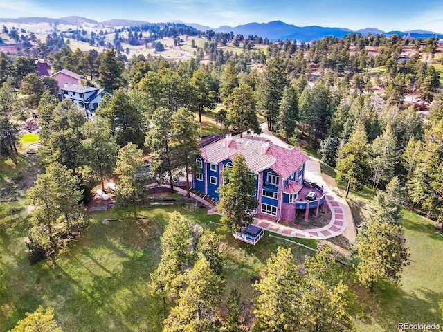 24140 US Highway 40, Golden, CO 80401 - aerial view of property and surrounding area with mountains