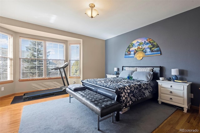 bedroom featuring dark wood-type flooring